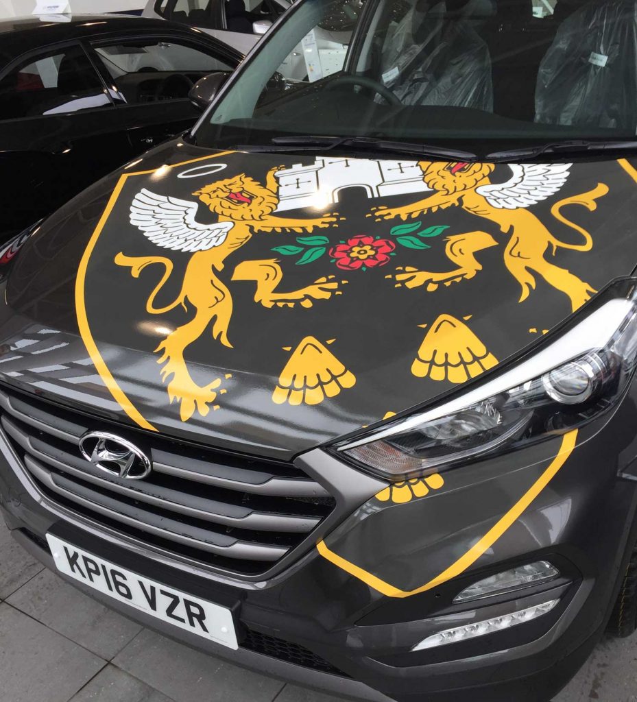 customised vehicle wrap for dealer promotion